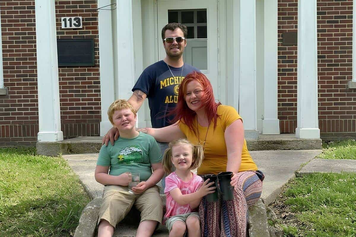 Smiling military family with two children. 